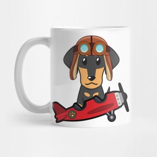 Cute dachshund is in a vintage plane Mug